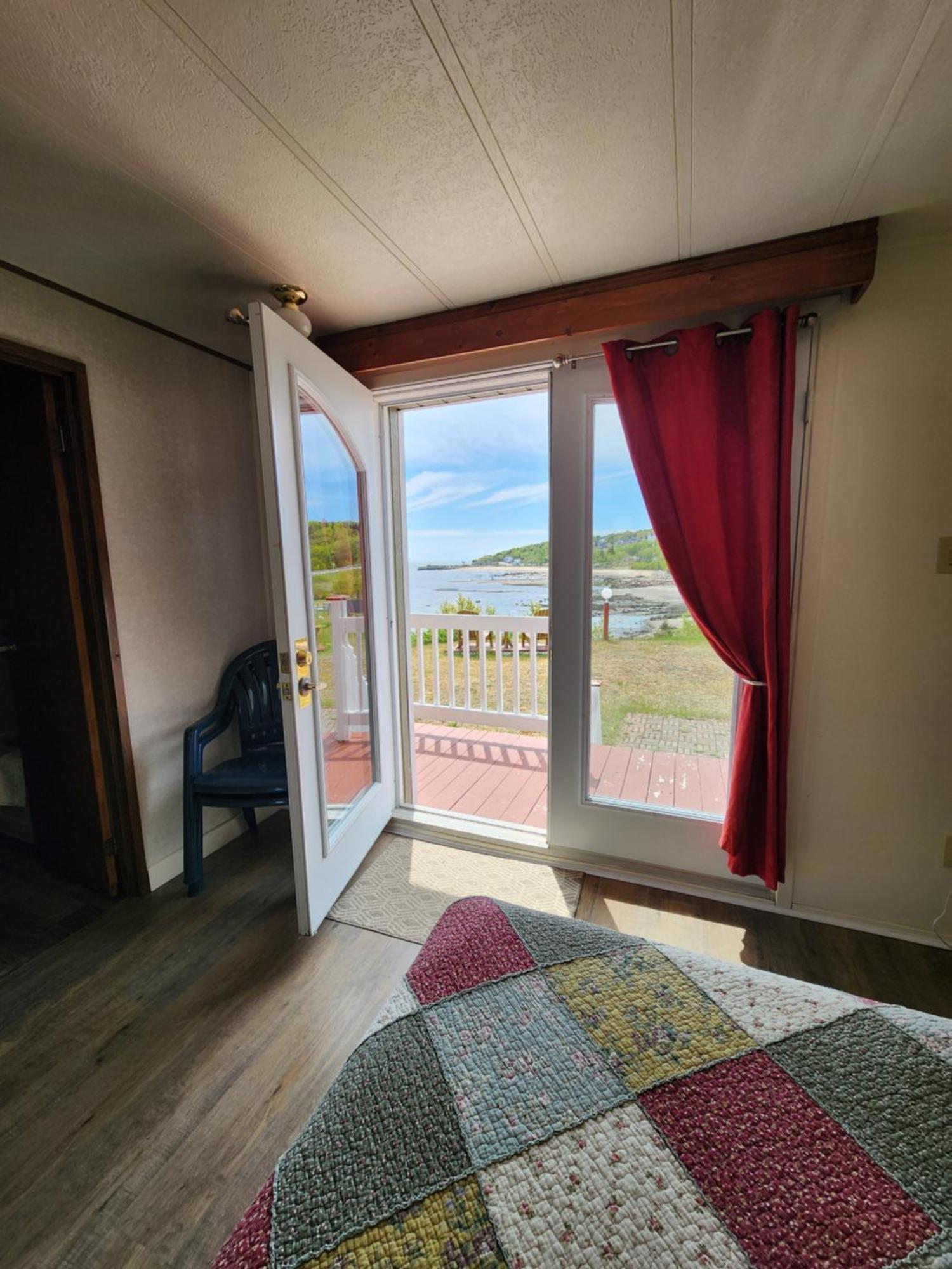 Motel Et Chalets Bo-Fleuve Evangeline Saint-Siméon Exteriör bild