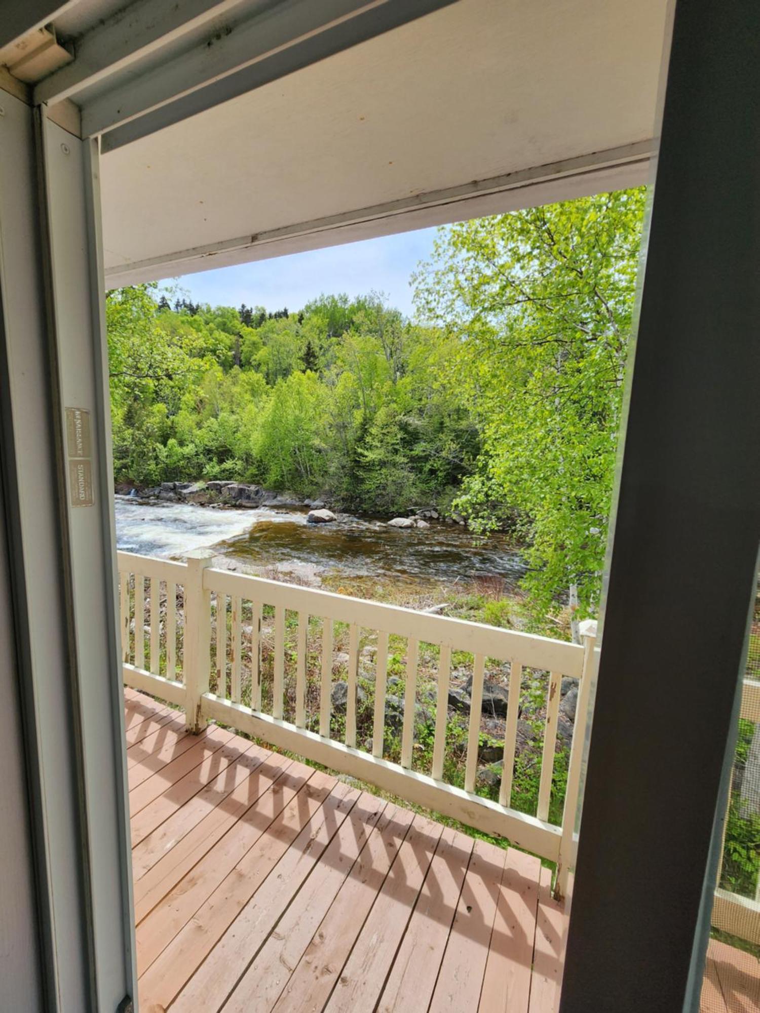 Motel Et Chalets Bo-Fleuve Evangeline Saint-Siméon Exteriör bild