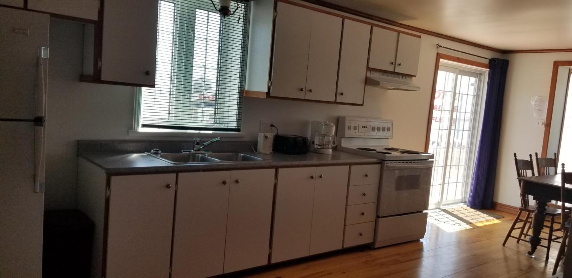 Motel Et Chalets Bo-Fleuve Evangeline Saint-Siméon Exteriör bild